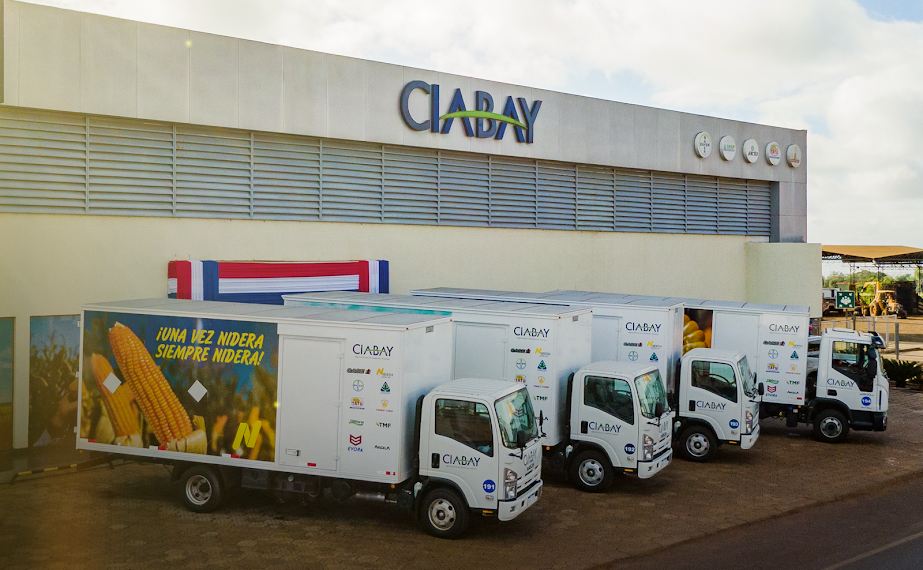 Casa CIABAY con la flota de camiones de reparto de insumos